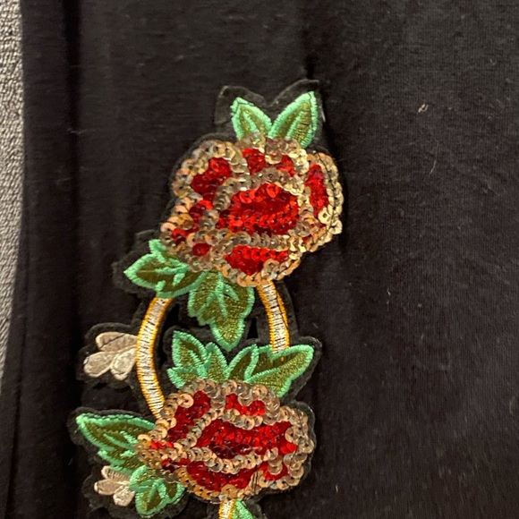 Small off the shoulder black top with sequin rose. - Picture 3 of 3